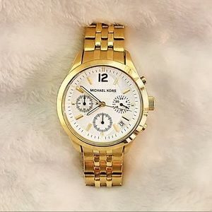 Gold Woman’s Michael Kors Watch